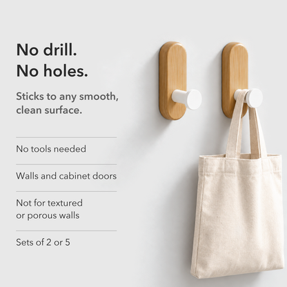 Card reading No drill. No holes., with two light wood hooks with white pegs and a tote hanging from one