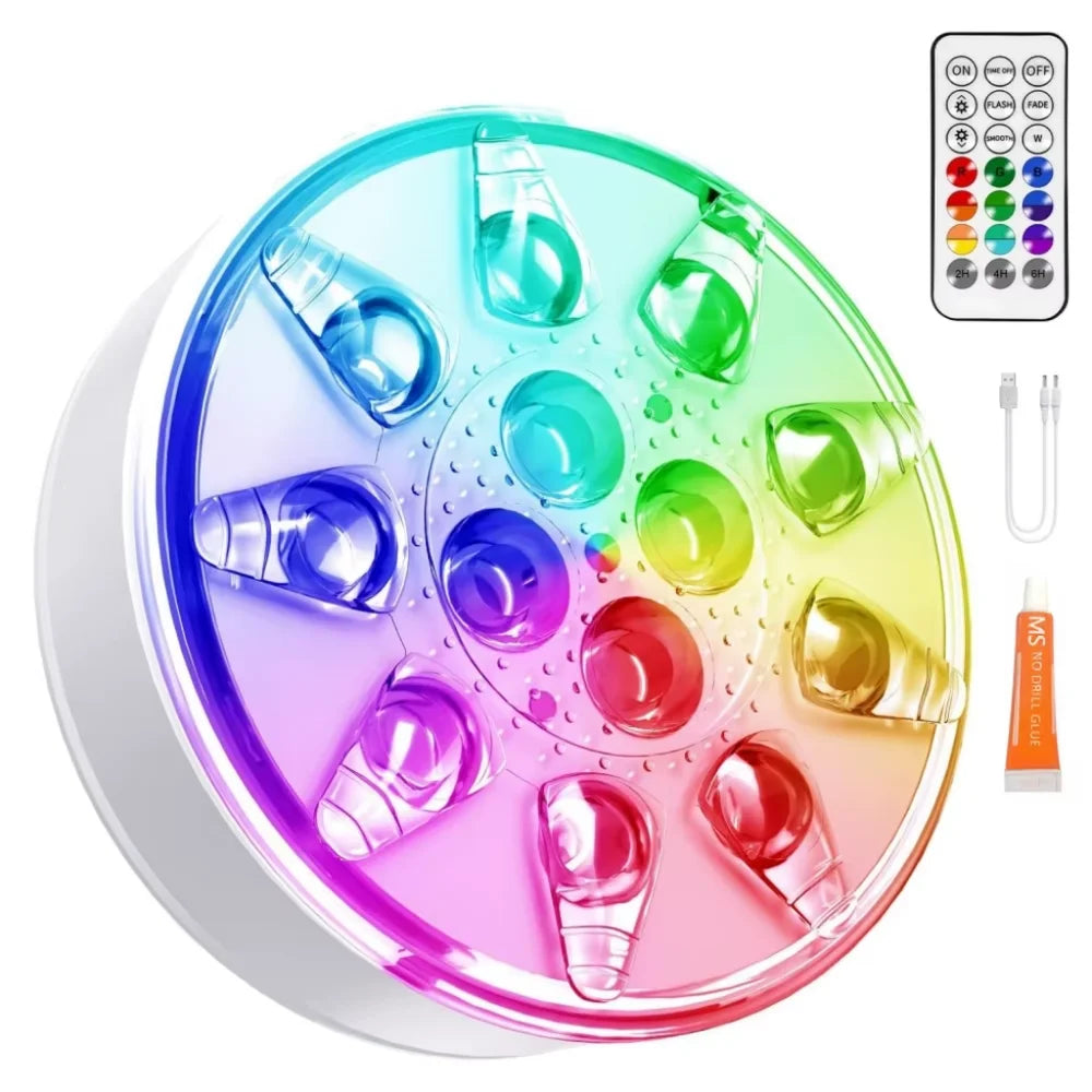 Rechargeable pool light with its remote control, USB charging cable and tube of adhesive on a white background