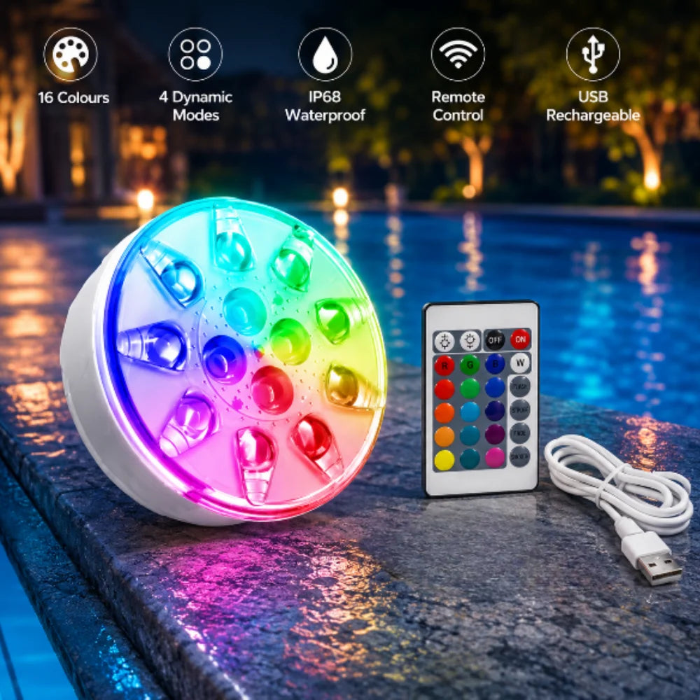 Pool light glowing beside a pool at night with a remote control and USB cable