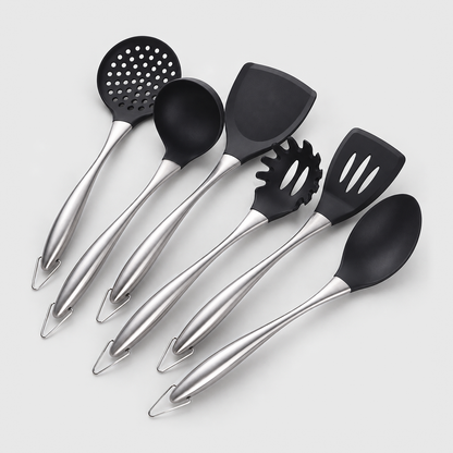 Six-piece cooking utensil set with black non-stick heads and brushed silver stainless steel handles, laid out on a light gray background