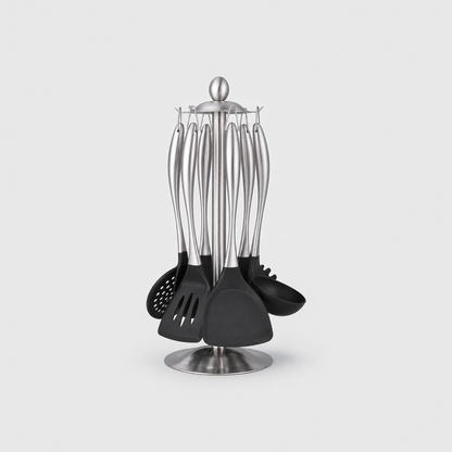 Silver cooking utensil set hanging head-down on a brushed steel stand, on a light gray background