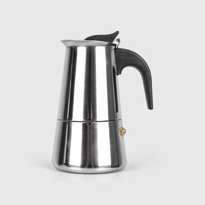 Polished stainless steel moka pot, 9 cup size, on a light gray background