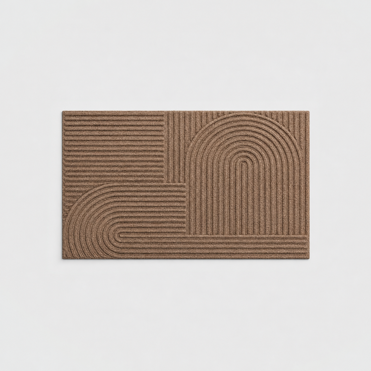 Brown grooved doormat with a raised arc pattern, seen from above on a light gray background