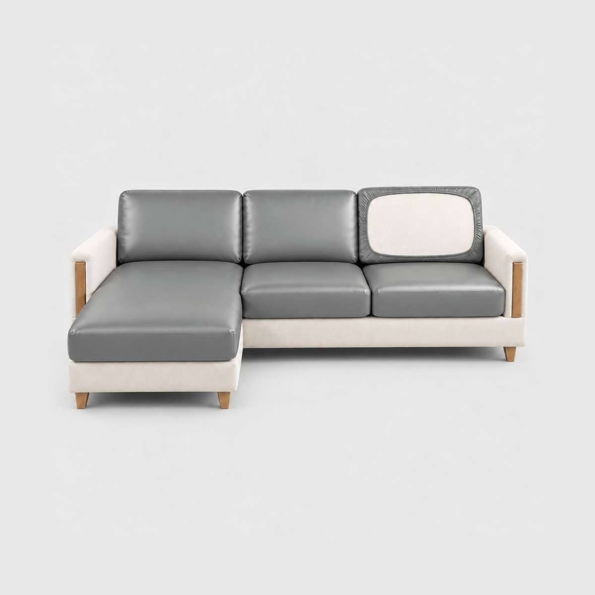 Sectional sofa with gray PU leather cushion covers on a light gray background
