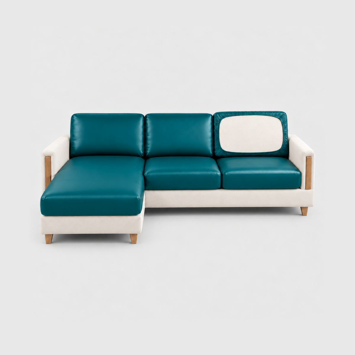 Sectional sofa with teal PU leather cushion covers on a light gray background