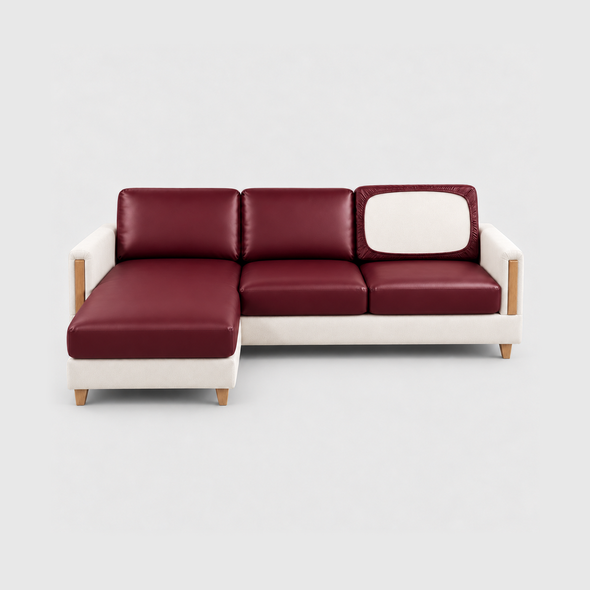 Sectional sofa with burgundy PU leather cushion covers on a light gray background