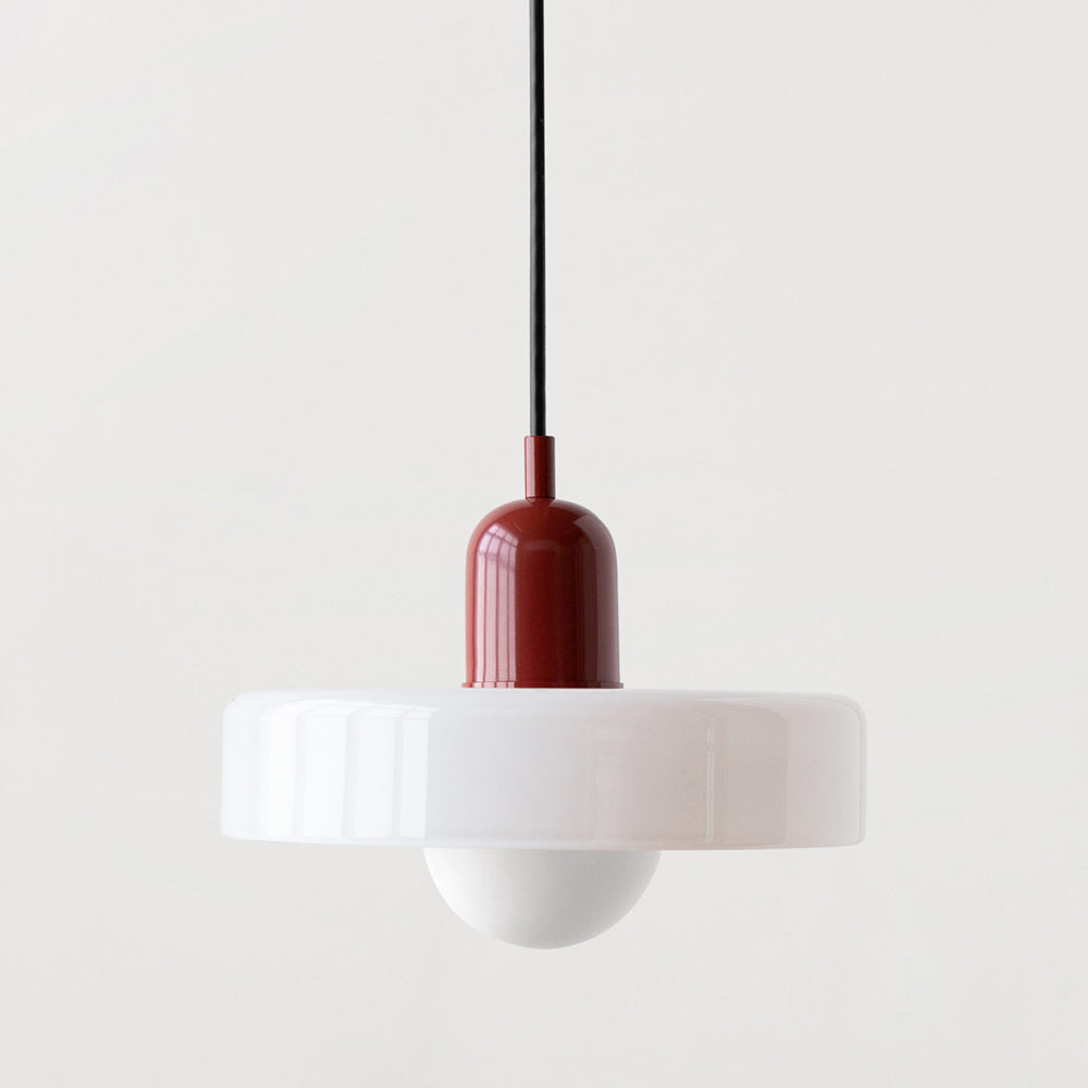 Bauhaus pendant light with a white glass ring shade and a burgundy body