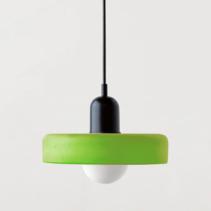 Bauhaus pendant light with a matte green glass ring shade and a black body