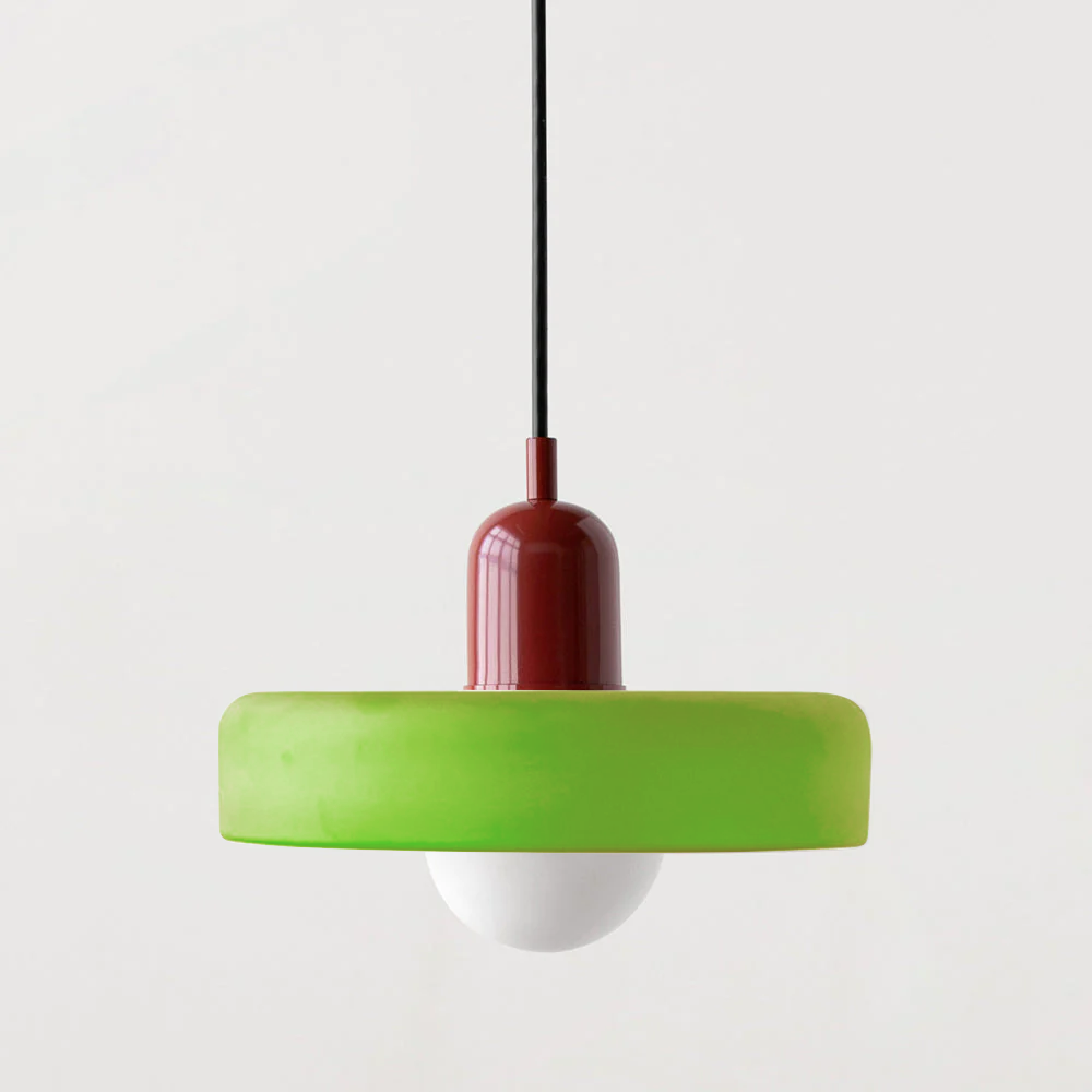 Bauhaus pendant light with a matte green glass ring shade and a burgundy body