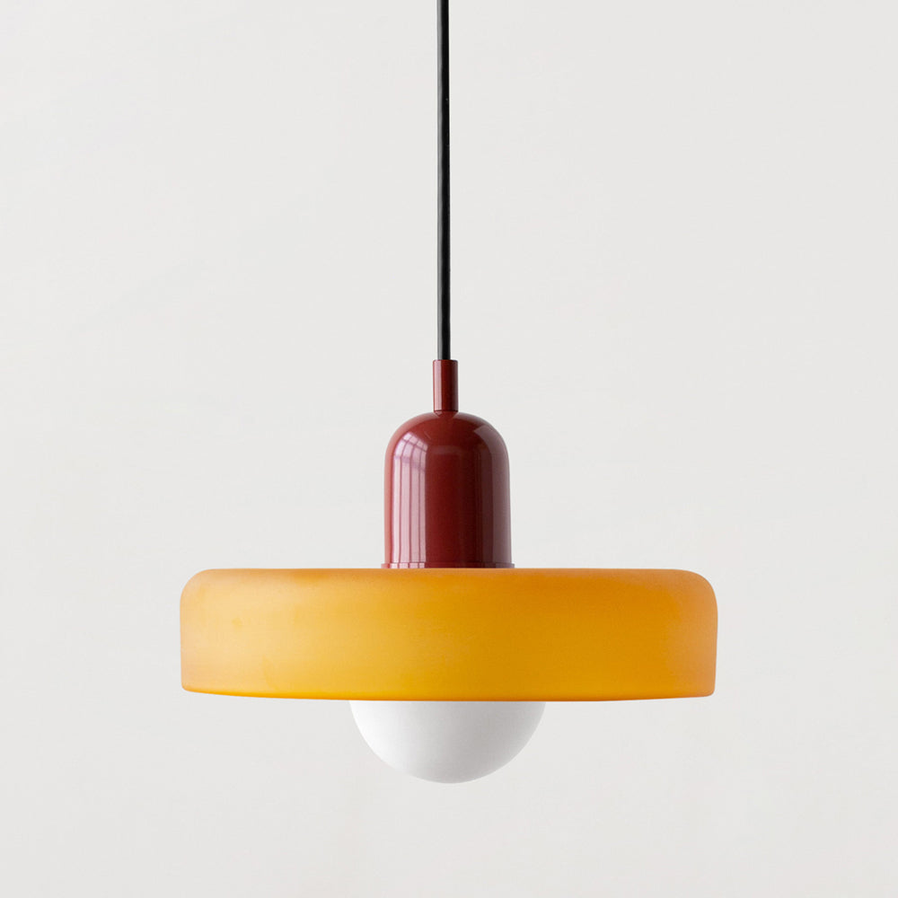 Bauhaus pendant light with a matte amber glass ring shade and a burgundy body
