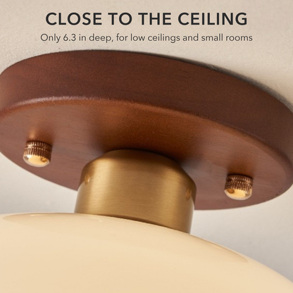 Close-up of the light's brown ceiling base, brass-tone neck and screws, with the words Close to the ceiling, only 6.3 in deep