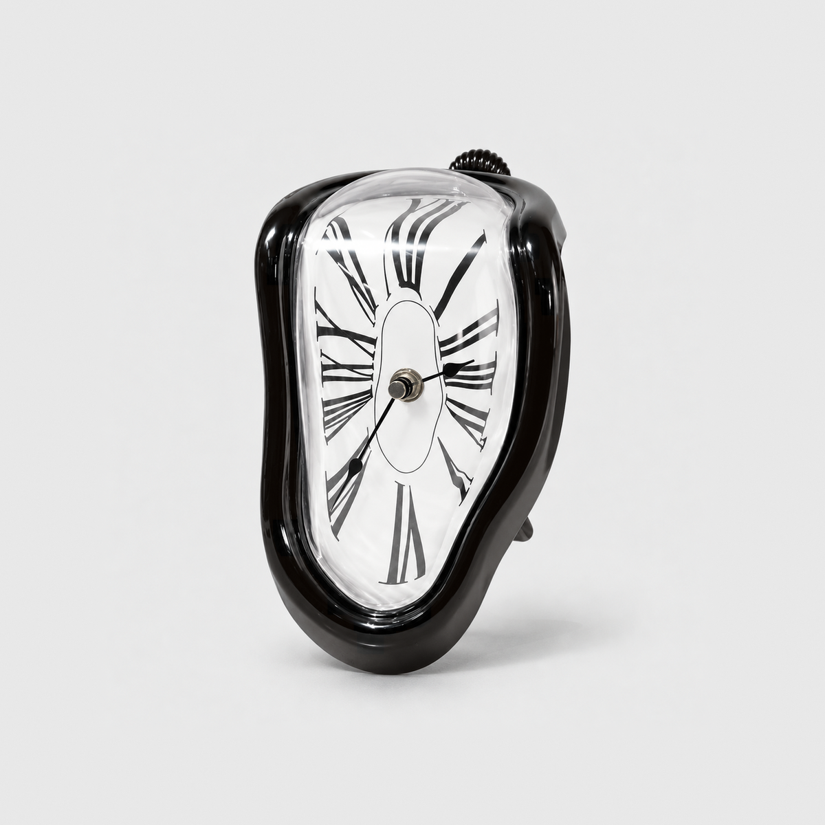A glossy black melting clock with stretched Roman numerals standing on a light gray background