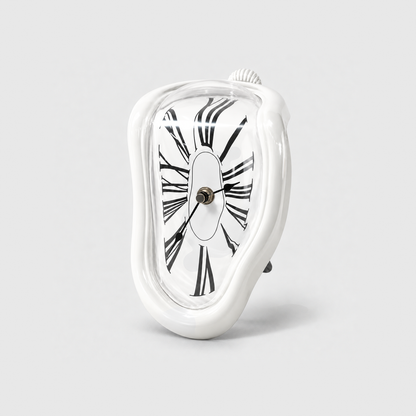 A glossy white melting clock with stretched Roman numerals standing on a light gray background