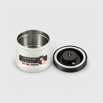 Empty vacuum coffee canister with a printed ONE BUTTON label on the front and its lid off, showing the bare stainless steel inside and the silicone seal ring under the lid