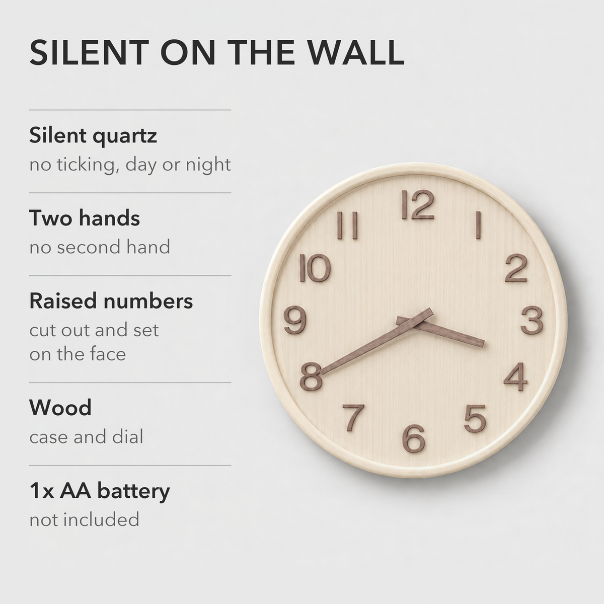Text card reading Silent on the wall, listing no ticking, no second hand, raised numbers, wood case and dial and one AA battery, beside the natural wood clock
