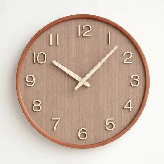 Brown wooden wall clock seen straight on, with a reddish-brown rim, mocha face and raised cream numbers and hands