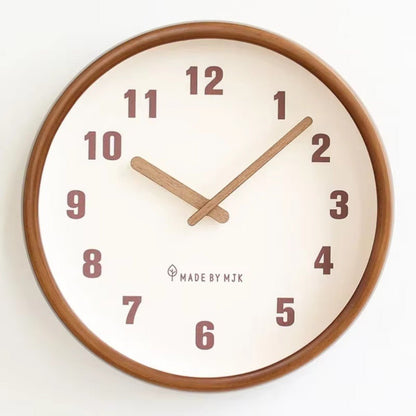 Straight-on front view of the White clock with its wood frame, large numbers and wooden hands
