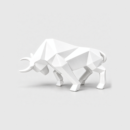 A white geometric bull sculpture with faceted planes, standing on a light gray background