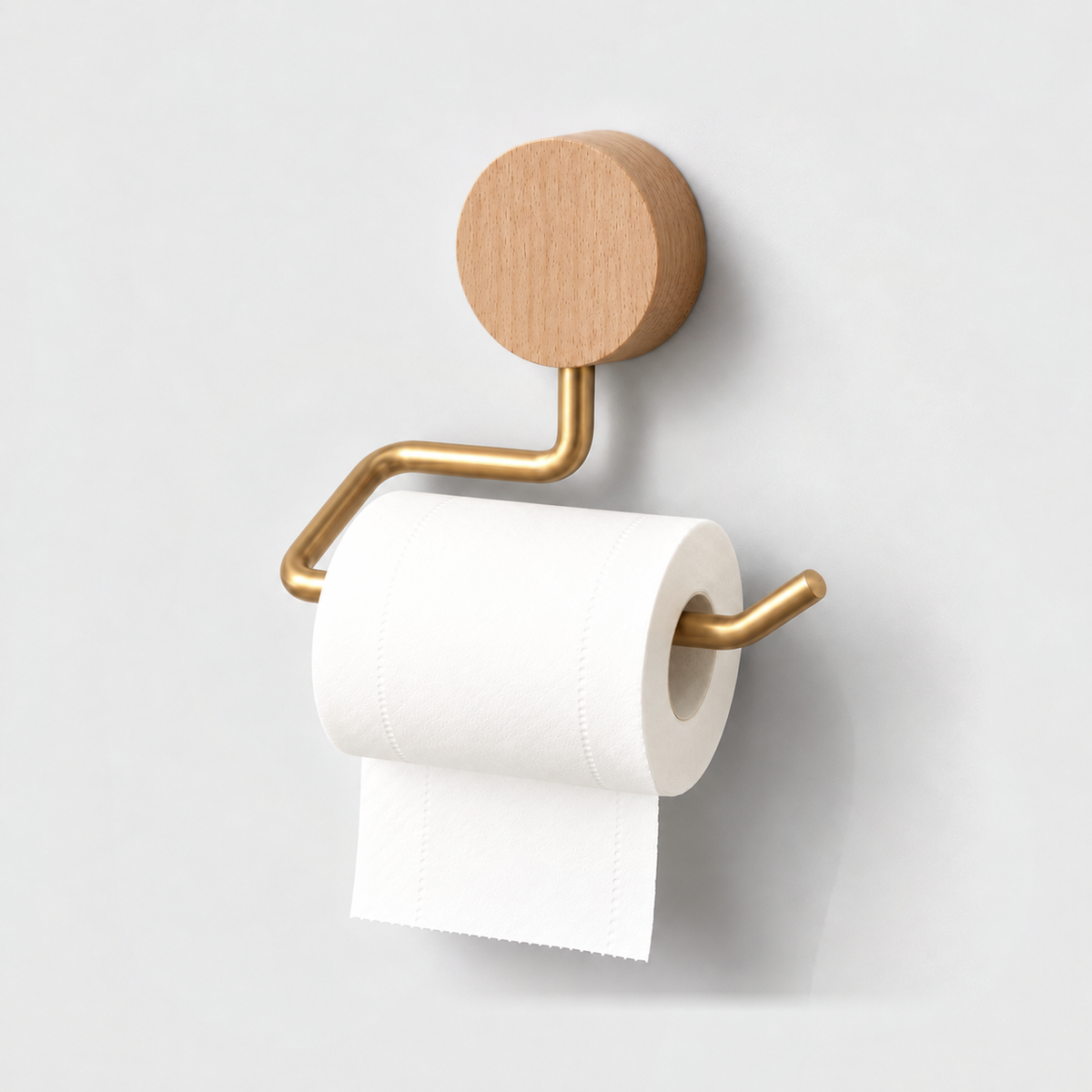 Natural wood and gold toilet paper holder with a roll