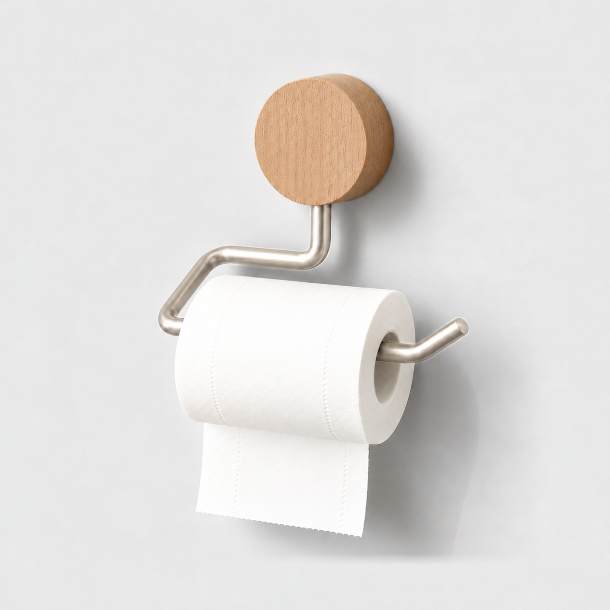 Natural wood and silver toilet paper holder with a roll
