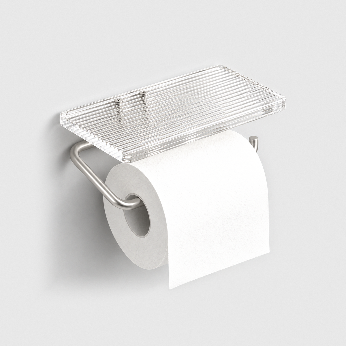 Toilet paper holder with a clear fluted acrylic shelf and a satin silver arm holding a white roll, fixed to a light gray wall