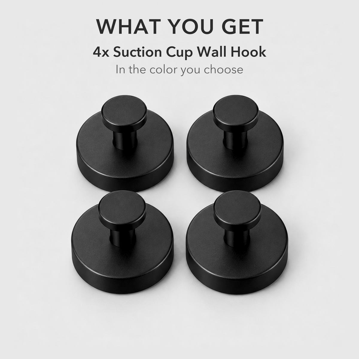Four black suction cup wall hooks, the set of four that comes in the box
