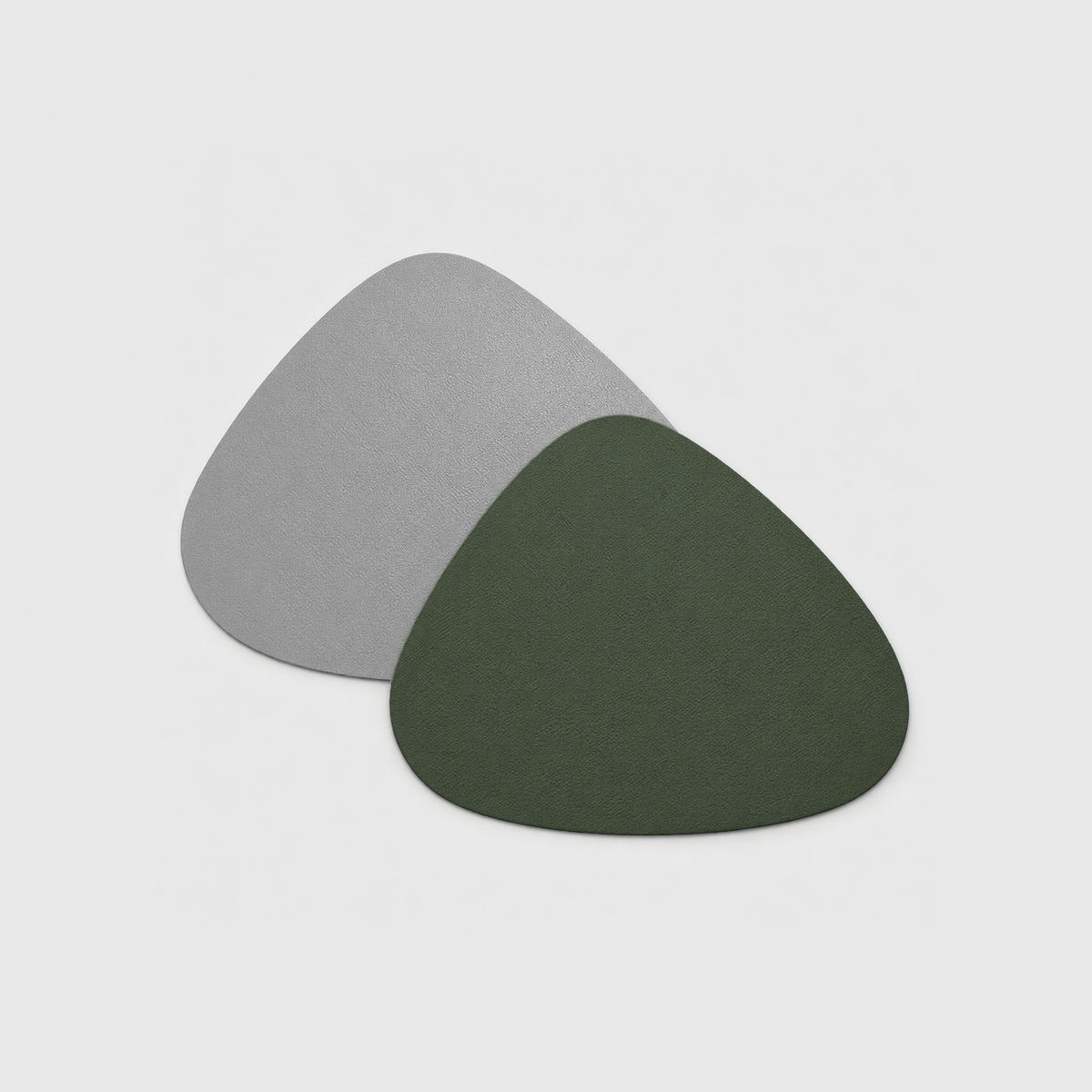 Two reversible placemats in Gray and Green, one showing the gray side and one the olive green side
