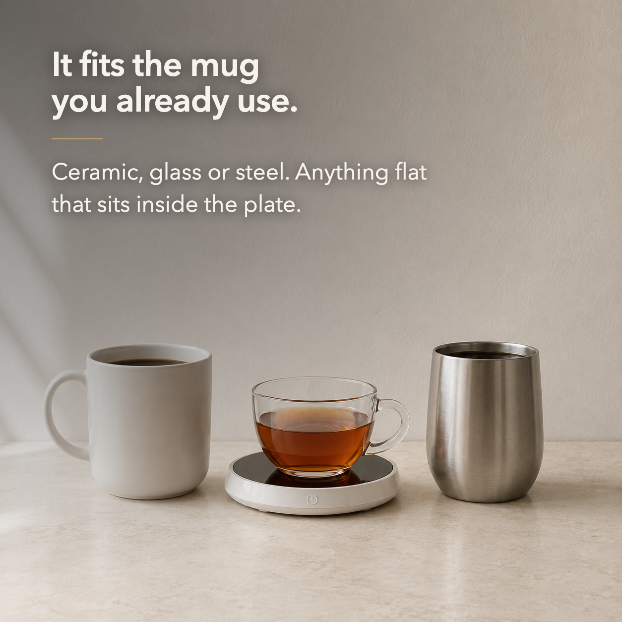 A ceramic mug, a glass cup and a steel tumbler beside the warmer, with the words it fits the mug you already use