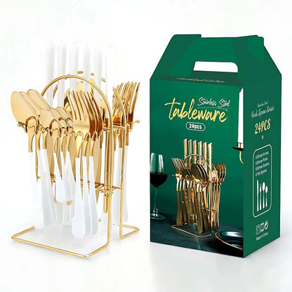 Cutlery set with white handles and gold heads hanging on a gold arched storage rack