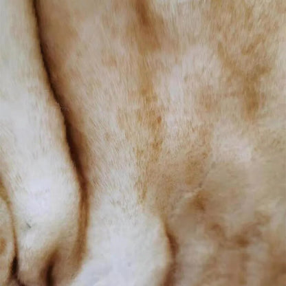 Close-up of the caramel faux fur, cream shading to warm golden caramel