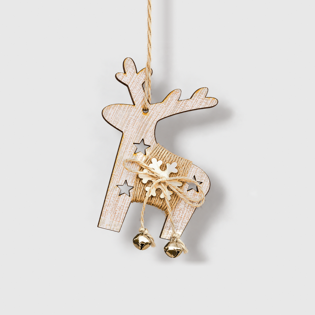 White-washed wooden reindeer Christmas ornament with a twine band, wooden snowflake and two small bells