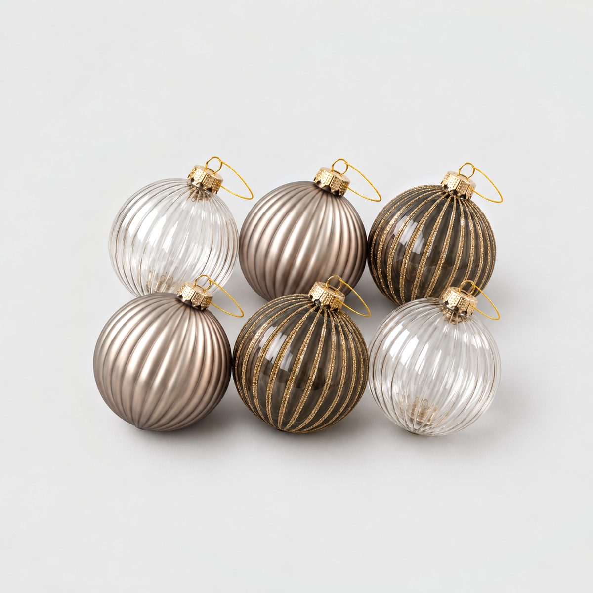 Six ribbed glass Christmas baubles in champagne satin, charcoal with gold glitter stripes and clear glass