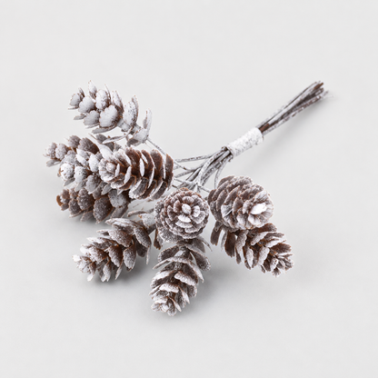 Bundle of ten small frosted pine cones on short stems, white frost over brown scales