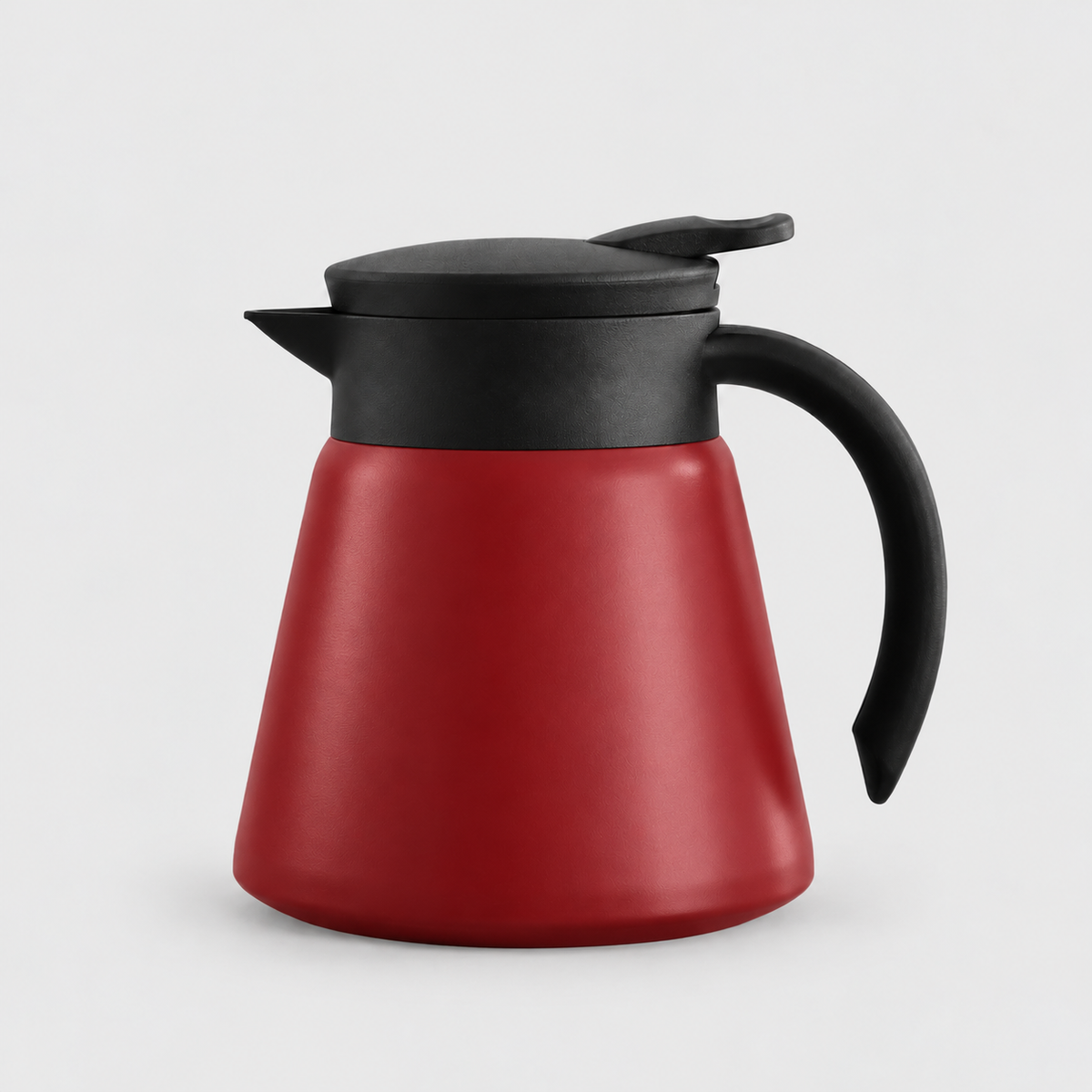Red thermal coffee carafe with a black lid, spout and handle on a light gray background