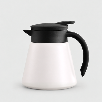 White thermal coffee carafe with a black lid, spout and handle on a light gray background