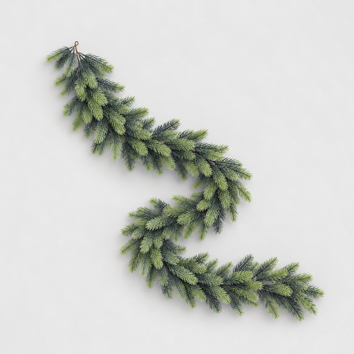 Dark green artificial pine garland, 75 inches long, laid in a loose curve on a light grey background