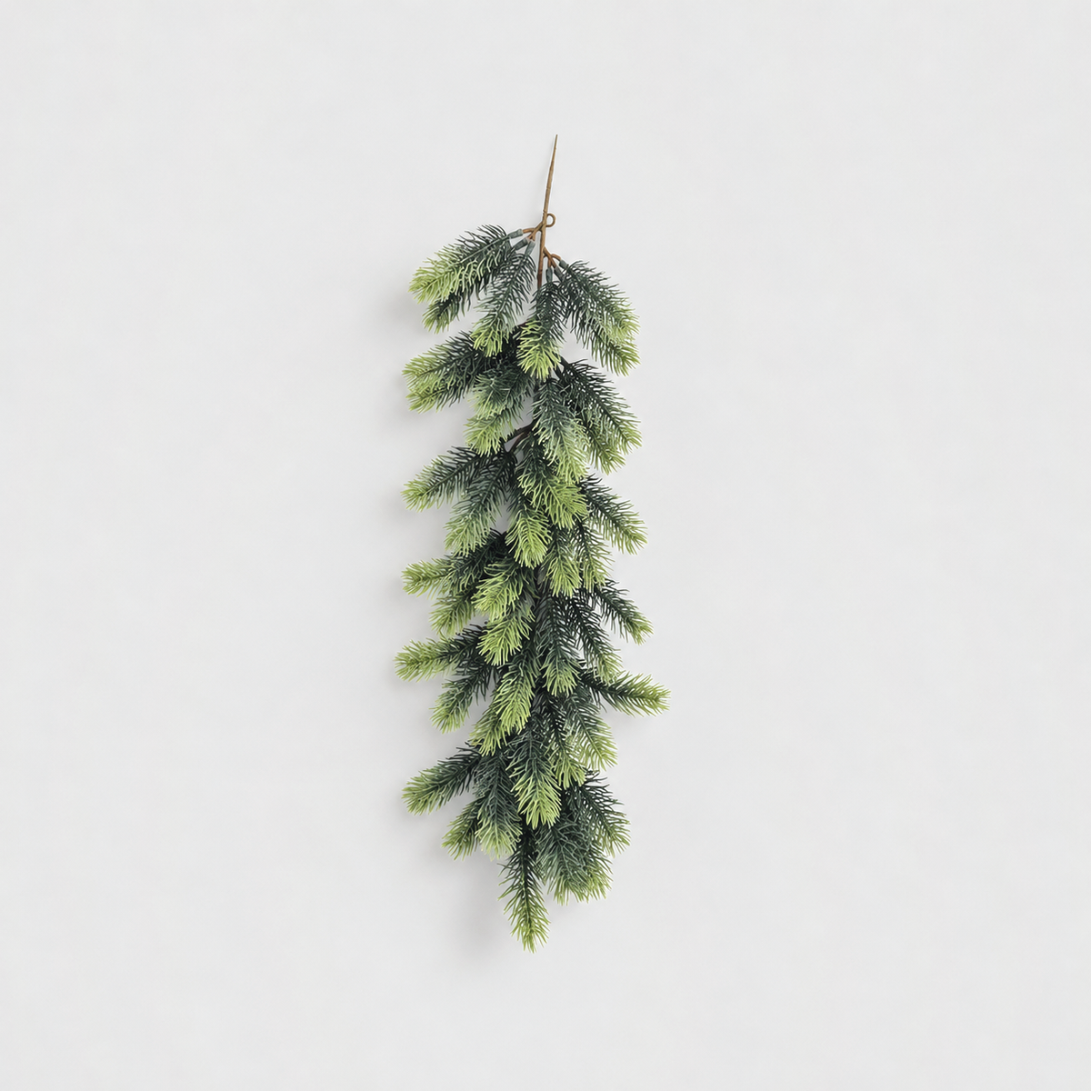 Short dark green artificial pine swag, 24 inches long, on a light grey background