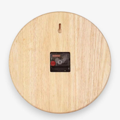 Back of the wood wall clock showing the keyhole hanging slot and the battery movement set into a square recess