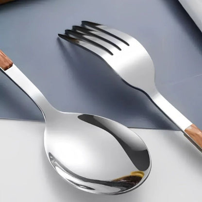 Close view of the mirror-polished silver soup spoon and fork