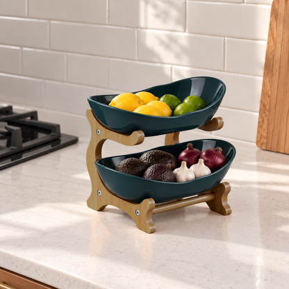Green two-tier stand with lemons, limes, avocados and garlic on a counter beside the stove