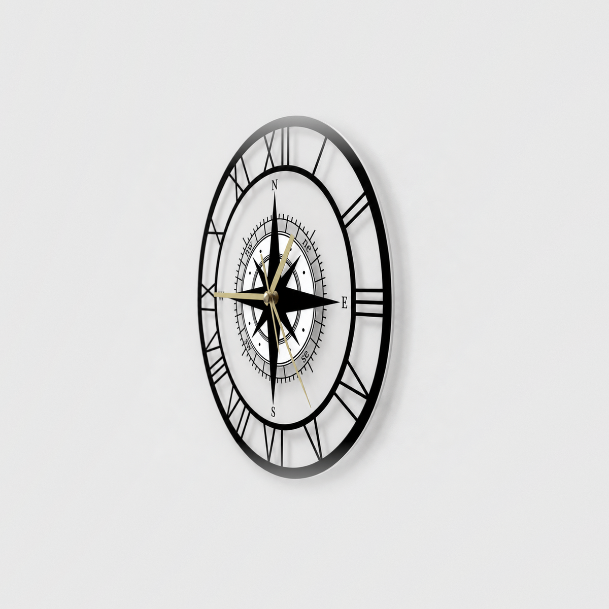 Side view of the compass wall clock showing its thin clear acrylic face and the white center disc standing off it