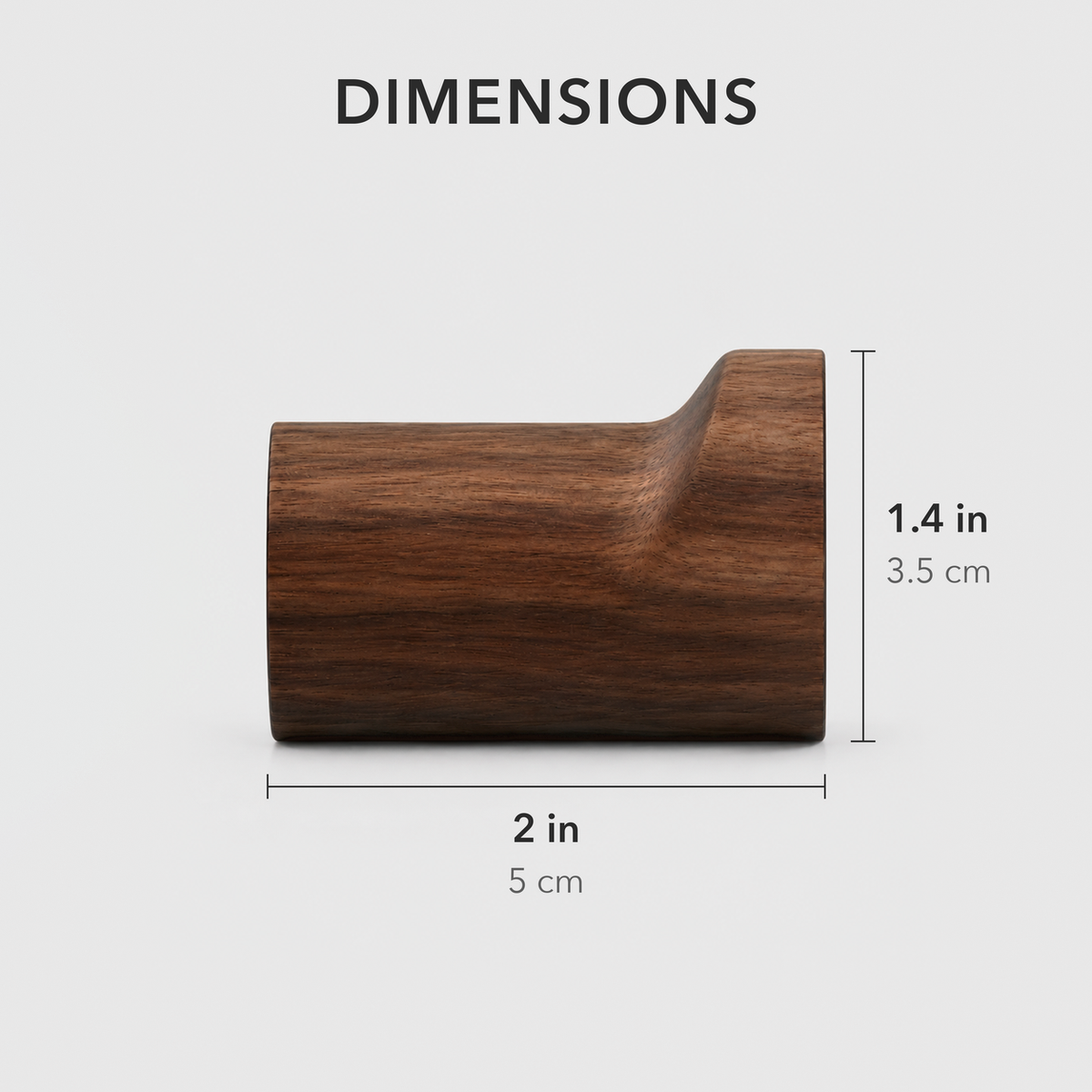 Side view of one walnut wall hook with lines showing 2 inches long and 1.4 inches tall