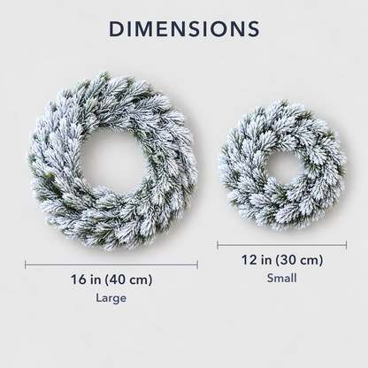 The large 16 inch and small 12 inch frosted pine wreaths side by side to show their sizes