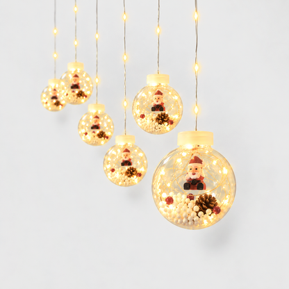 Christmas ball curtain lights with a Santa figure inside each clear globe, glowing warm white on a light gray background