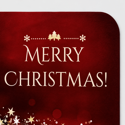 Close-up of the ivory Merry Christmas lettering, snowflakes and little fir trees printed on the red door mat