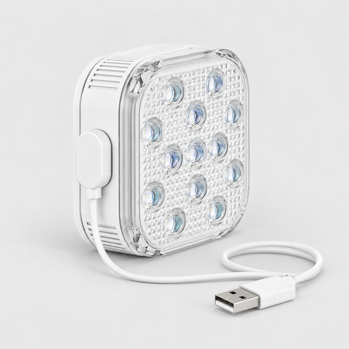 Square pool light charging with a magnetic USB cable clipped onto the contacts on its side
