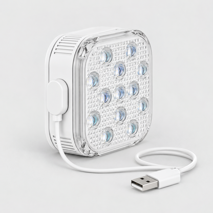 Square pool light charging with a magnetic USB cable clipped onto the contacts on its side