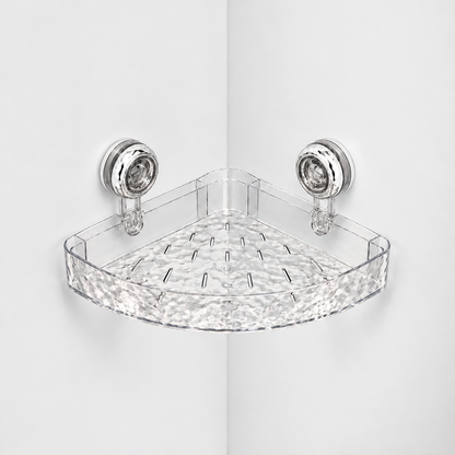 Clear corner shower shelf with a rippled front and a slotted rippled floor, held in a light grey corner by two chrome suction cups