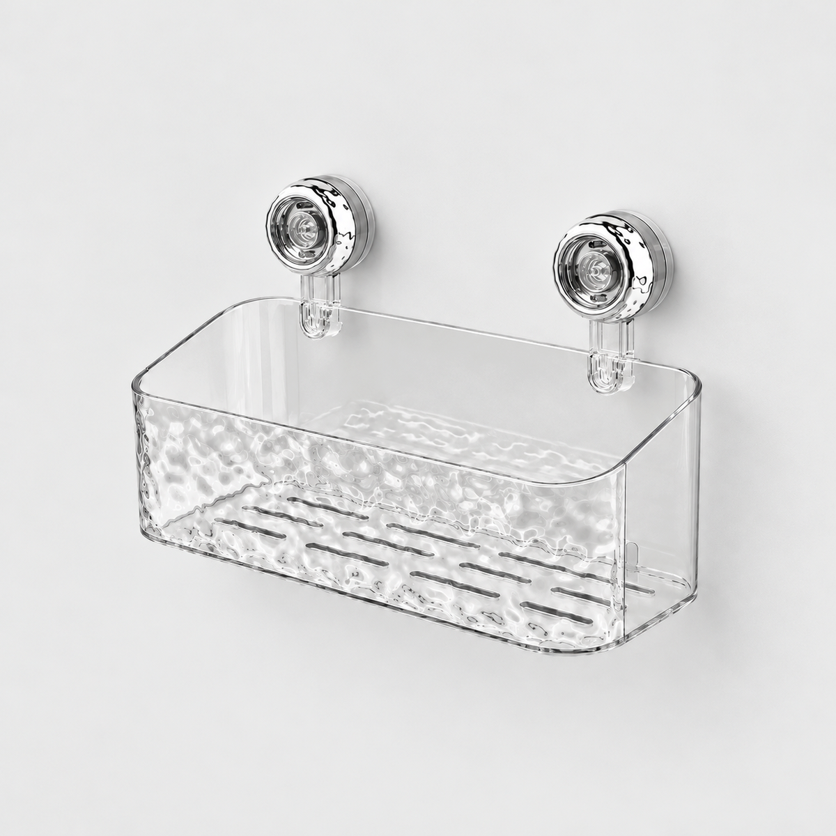 Clear deep shower basket with a rippled front, flat sides that slope down to the front and two chrome suction cups
