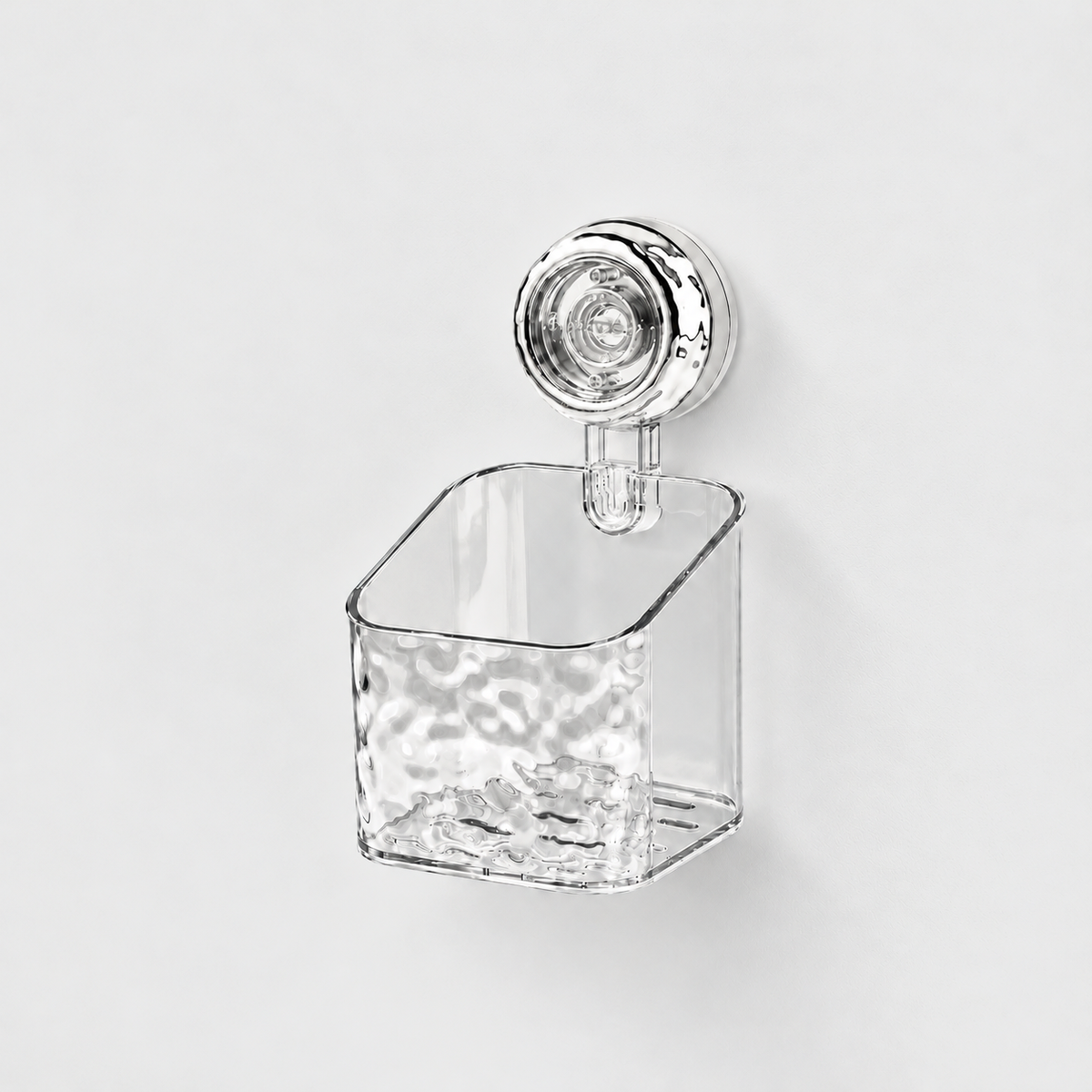Clear small holder with a rippled front and a sloping open top, on a single chrome suction cup